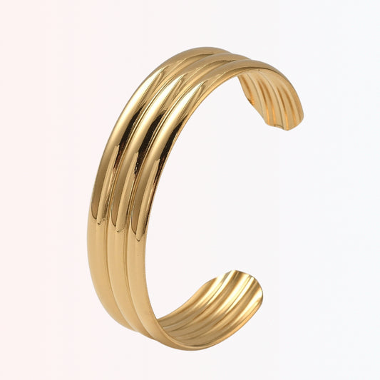 Pulsera Cuff de Tres Líneas de Stainless Steel con Baño en Oro 18K