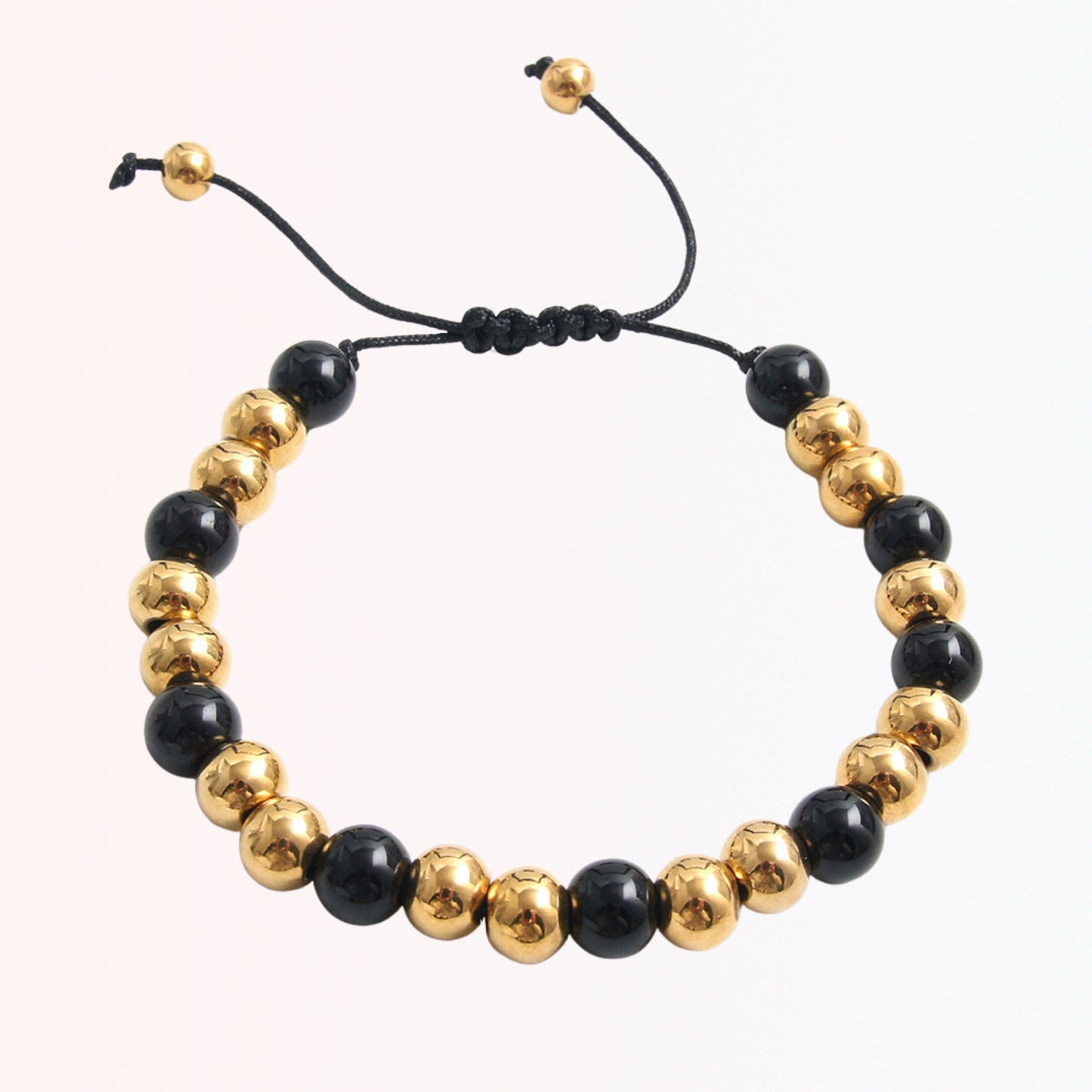 Pulsera Ajustable con Beads Negros y Dorados en Stainless Steel