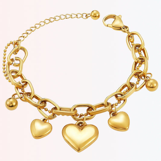 Pulsera Dorada de “Charms” de Corazones en Titanio